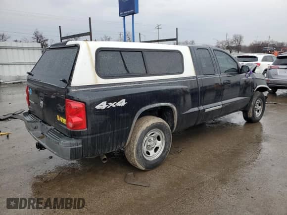 2006 Dodge Dakota ST с VIN 1D7HW22K06S714578, выставлен на аукционе Copart как лот 45666875 с пробегом 129 988 миль миль и Списание • Salvage title. История ставок и продаж доступна на DreamBid. Изображение 3.
