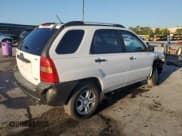 ✅ 2006 Kia Sportage LX • VIN: KNDJF723567289878 • Lot: 69359905. Listed on Copart with 236,123 mi. Free auction sales archive from the USA and detailed vehicle history report at DreamBid. Image 3.