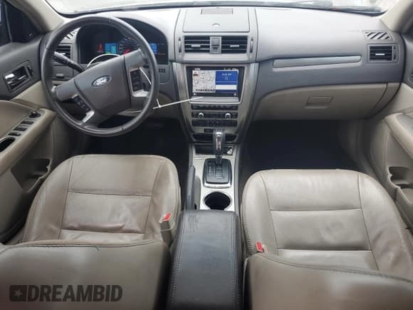 ✅ 2012 Ford Fusion Hybrid • VIN: 3FADP0L35CR259788 • Lot: 82338605. Wystawiony na Copart z przebiegiem 206 321 mil. Bezpłatny archiwum sprzedaży aukcyjnych z USA i szczegółowy raport historii pojazdu na DreamBid. Zdjęcie 8.