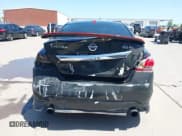 ✅ 2014 Nissan Altima SL • VIN: 1N4BL3AP0EC202412 • Lot: 41987482. Wystawiony na IAAI z przebiegiem 98 225 mil. Bezpłatny archiwum sprzedaży aukcyjnych z USA i szczegółowy raport historii pojazdu na DreamBid. Zdjęcie 6.