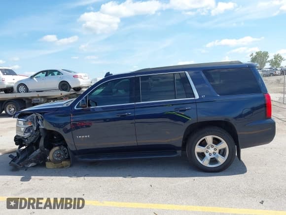 ✅ 2019 Chevrolet Tahoe LT • VIN: 1GNSKBKC8KR214892 • Lot: 42702156. Listed on IAAI with 60,779 mi. Free auction sales archive from the USA and detailed vehicle history report at DreamBid. Image 15.