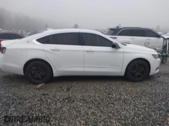 ✅ 2016 Chevrolet Impala LS • VIN: 2G11X5SA7G9159951 • Lot: 41914109. Listed on IAAI with 135,432 mi. Free auction sales archive from the USA and detailed vehicle history report at DreamBid. Image 13.