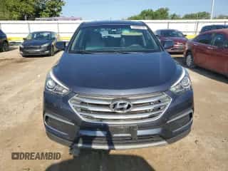 2018 Hyundai Santa Fe 2.4L z VIN 5NMZTDLB9JH095100, wystawiony jako Copart lot #64850795 z przebiegiem 92 794 mil mil oraz Szkoda całkowita • Salvage title. Historia ofert i sprzedaży dostępna na DreamBid. Obrazek 5.