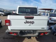 ✅ 2021 Jeep Gladiator Rubicon • VIN: 1C6JJTBM6ML588033 • Lot: 41712780. Listed on IAAI with 26,058 mi. Free auction sales archive from the USA and detailed vehicle history report at DreamBid. Image 16.