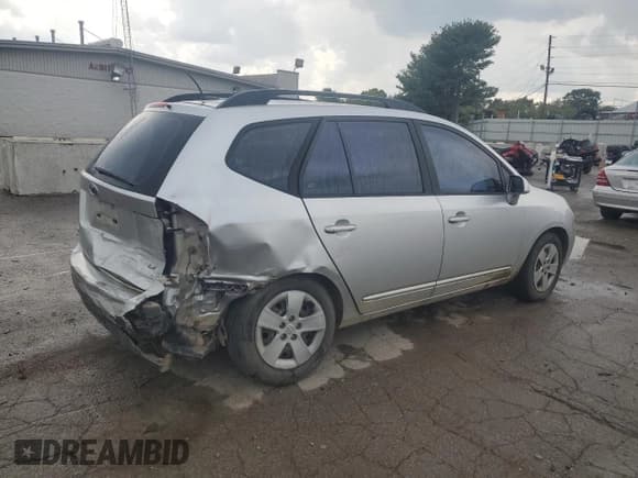 ✅ 2009 Kia Rondo LX • VIN: KNAFG528797259799 • Лот: 69482334. Опубликован ранее на Copart с пробегом 194 451 миль. Бесплатный доступ к архиву аукционных продаж из США и подробный отчёт об истории автомобиля на DreamBid. Изображение 3.