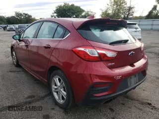 ✅ 2018 Chevrolet Cruze LT • VIN: 3G1BE6SM4JS526857 • Lot: 61126152. Listed on Copart with 127,435 mi. Free auction sales archive from the USA and detailed vehicle history report at DreamBid. Image 3.