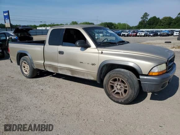 2002 Dodge Dakota с VIN 1B7GL12X02S545788, выставлен на аукционе Copart как лот 69987164 с пробегом 247 912 миль миль и Списание • Salvage title. История ставок и продаж доступна на DreamBid. Изображение 4.