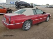 ✅ 2002 Cadillac Eldorado ESC • VIN: 1G6EL12Y22B101556 • Lot: 65088825. Listed on Copart with 107,057 mi. Free auction sales archive from the USA and detailed vehicle history report at DreamBid. Image 3.