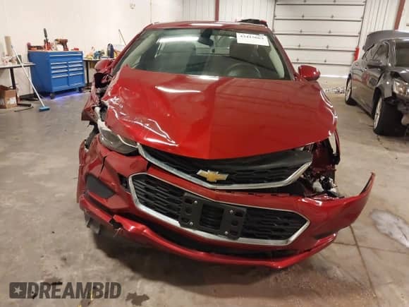 2018 Chevrolet Cruze LT z VIN 1G1BE5SM7J7234614, wystawiony jako IAAI lot #43415663 z przebiegiem 24 226 mil mil oraz . Historia ofert i sprzedaży dostępna na DreamBid. Obrazek 13.