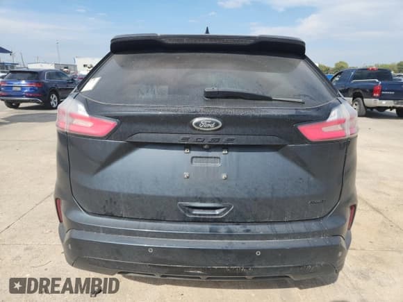 ✅ 2022 Ford Edge SE • VIN: 2FMPK4G97NBA67233 • Lot: 82543595. Listed on Copart with 106,354 mi. Free auction sales archive from the USA and detailed vehicle history report at DreamBid. Image 6.