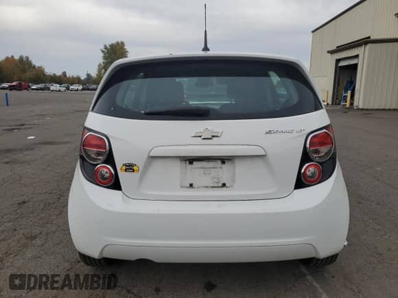2013 Chevrolet Sonic LT with VIN 1G1JC6SG0D4230167, listed as a Copart auction lot 90614715 with 143,604 mi miles and Clean title. Bid and sale history available at DreamBid. Image 6.