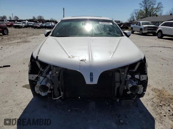 ✅ 2015 Lincoln MKS • VIN: 1LNHL9DK7FG605218 • Лот: 50882695. Опубликован ранее на Copart с пробегом 160 907 миль. Бесплатный доступ к архиву аукционных продаж из США и подробный отчёт об истории автомобиля на DreamBid. Изображение 5.