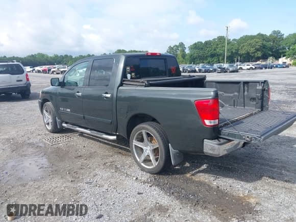 ✅ 2008 Nissan Titan SE • VIN: 1N6BA07D18N310751 • Lot: 42238195. Listed on IAAI with 229,697 mi. Free auction sales archive from the USA and detailed vehicle history report at DreamBid. Image 3.
