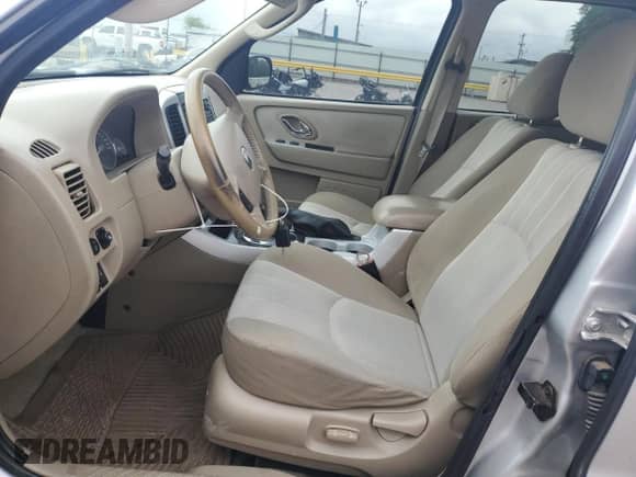 2006 Mercury Mariner Luxury z VIN 4M2CU56196KJ17209, wystawiony jako Copart lot #58450665 z przebiegiem 239 728 mil mil oraz Szkoda całkowita • Salvage title. Historia ofert i sprzedaży dostępna na DreamBid. Obrazek 7.