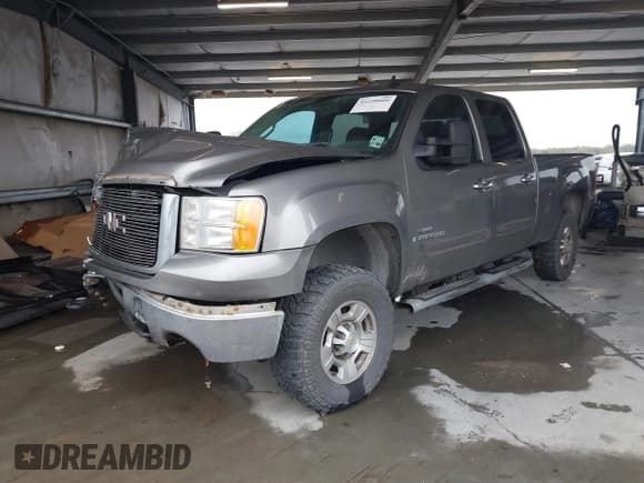 ✅ 2009 GMC Sierra 2500HD SLE • VIN: 1GTHK53609F145317 • Лот: 41298009. Опубликован ранее на IAAI с пробегом 190 900 миль. Бесплатный доступ к архиву аукционных продаж из США и подробный отчёт об истории автомобиля на DreamBid. Изображение 2.