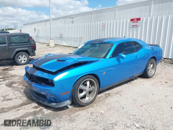 ✅ 2015 Dodge Challenger R/T Scat Pack Shaker • VIN: 2C3CDZFJ7FH833230 • Lot: 42818654. Listed on IAAI with 55,197 mi. Free auction sales archive from the USA and detailed vehicle history report at DreamBid. Image 2.
