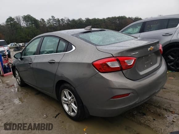 ✅ 2018 Chevrolet Cruze LT • VIN: 1G1BE5SM3J7151374 • Lot: 68614242. Listed on Copart with 24,033 mi. Free auction sales archive from the USA and detailed vehicle history report at DreamBid. Image 2.