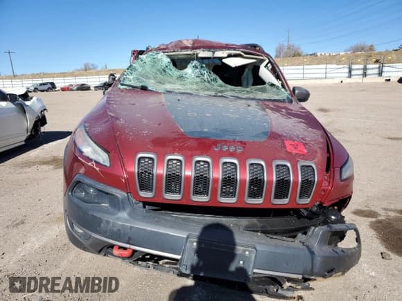 ✅ 2015 Jeep Cherokee Trailhawk • VIN: 1C4PJMBS4FW577590 • Lot: 92803025. Listed on Copart with 163,417 mi. Free auction sales archive from the USA and detailed vehicle history report at DreamBid. Image 5.