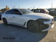 ✅ 2023 BMW i4 eDrive40 • VIN: WBY73AW05PFN81536 • Lot: 90058295. Listed on Copart with 48,275 mi. Free auction sales archive from the USA and detailed vehicle history report at DreamBid. Image 4.