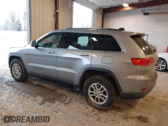 ✅ 2019 Jeep Grand Cherokee Laredo E • VIN: 1C4RJFAG8KC823814 • Lot: 41728782. Listed on IAAI with 120,695 mi. Free auction sales archive from the USA and detailed vehicle history report at DreamBid. Image 3.