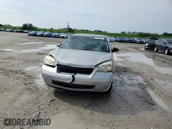 2007 Chevrolet Malibu LS z VIN 1G1ZS58N37F254204, wystawiony jako Copart lot #80102925 z przebiegiem 189 842 mil mil oraz Szkoda całkowita • Salvage title. Historia ofert i sprzedaży dostępna na DreamBid. Obrazek 13.