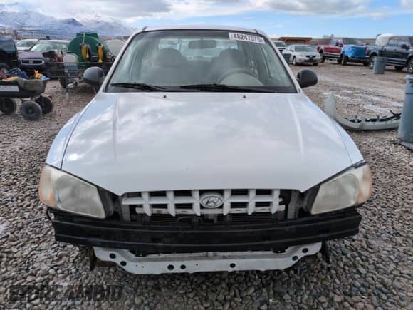 2002 Hyundai Accent GL z VIN KMHCG45C82U358523, wystawiony jako Copart lot #48247575 z przebiegiem 164 869 mil mil oraz Szkoda całkowita • Salvage title. Historia ofert i sprzedaży dostępna na DreamBid. Obrazek 5.