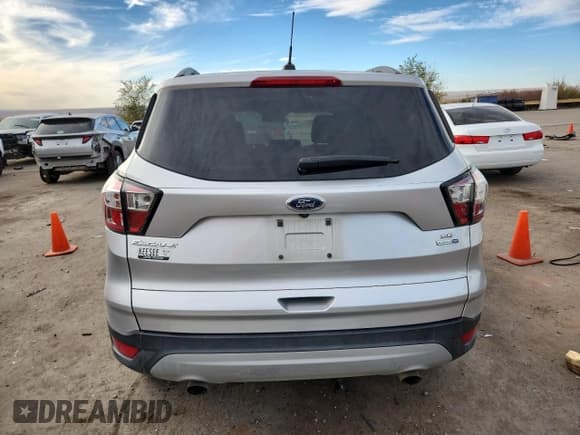 ✅ 2018 Ford Escape SE • VIN: 1FMCU9GD6JUA73698 • Lot: 92216765. Wystawiony na Copart z przebiegiem 114 579 mil. Bezpłatny archiwum sprzedaży aukcyjnych z USA i szczegółowy raport historii pojazdu na DreamBid. Zdjęcie 6.