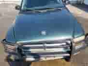 2002 Dodge Dakota SLT with VIN 1B7HG48N12S634155, listed as a Copart auction lot 71431625 with 227,575 mi miles and Salvage title. Bid and sale history available at DreamBid. Image 11.