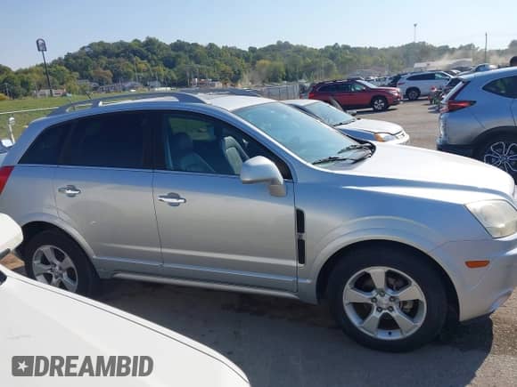 2013 Chevrolet Captiva Sport LTZ z VIN 3GNAL4EK1DS617118, wystawiony jako IAAI lot #43467944 z przebiegiem 73 297 mil mil oraz . Historia ofert i sprzedaży dostępna na DreamBid. Obrazek 13.