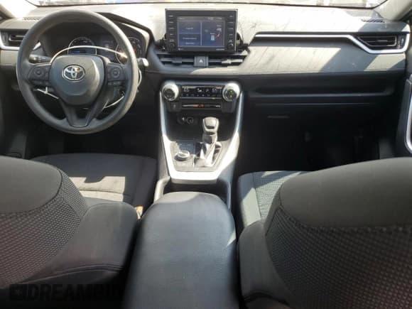 ✅ 2021 Toyota RAV4 Hybrid LE • VIN: 2T3MWRFV2MW115644 • Lot: 82408845. Listed on Copart with 26,080 mi. Free auction sales archive from the USA and detailed vehicle history report at DreamBid. Image 8.