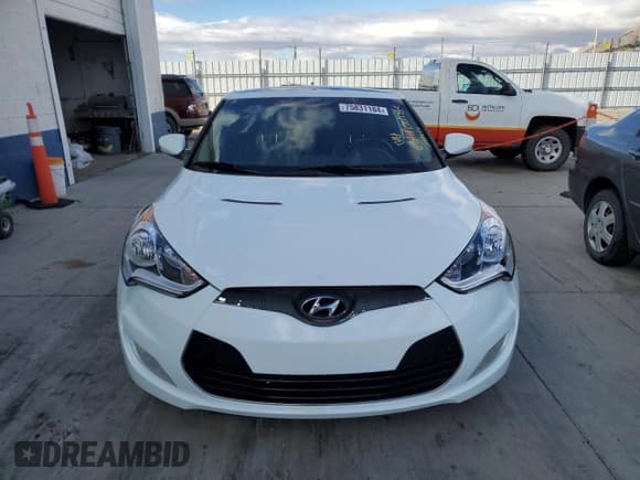 ✅ 2014 Hyundai Veloster • VIN: KMHTC6AD4EU196223 • Lot: 75831184. Wystawiony na Copart z przebiegiem 106 090 mil. Bezpłatny archiwum sprzedaży aukcyjnych z USA i szczegółowy raport historii pojazdu na DreamBid. Zdjęcie 5.