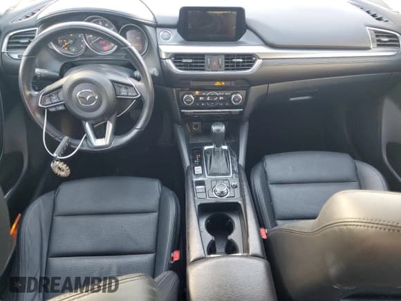 ✅ 2017 Mazda 6 Touring • VIN: JM1GL1V58H1127665 • Лот: 92947105. Опубликован ранее на Copart с пробегом 38 988 миль. Бесплатный доступ к архиву аукционных продаж из США и подробный отчёт об истории автомобиля на DreamBid. Изображение 8.