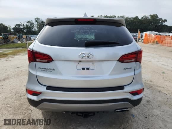 ✅ 2017 Hyundai Santa Fe 2.4L • VIN: 5XYZU3LB9HG430643 • Lot: 91221195. Wystawiony na Copart z przebiegiem 80 521 mil. Bezpłatny archiwum sprzedaży aukcyjnych z USA i szczegółowy raport historii pojazdu na DreamBid. Zdjęcie 6.