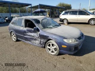 ✅ 2002 Mazda Protege • VIN: JM1BJ245921501313 • Лот: 74797214. Опубликован ранее на Copart с пробегом 241 536 миль. Бесплатный доступ к архиву аукционных продаж из США и подробный отчёт об истории автомобиля на DreamBid. Изображение 4.