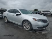 ✅ 2014 Lincoln MKS EcoBoost • VIN: 1LNHL9FT4EG600658 • Lot: 70491155. Listed on Copart with 101,441 mi. Free auction sales archive from the USA and detailed vehicle history report at DreamBid. Image 4.