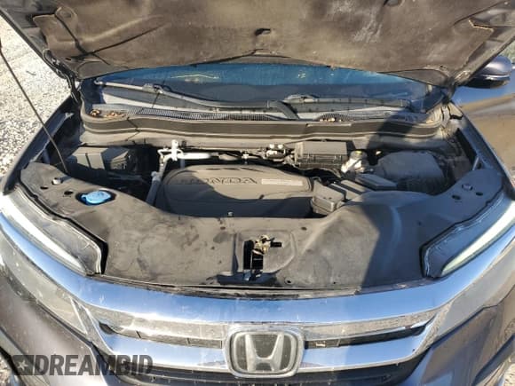 ✅ 2020 Honda Pilot Touring 7-Passenger • VIN: 5FNYF5H65LB021603 • Lot: 87042225. Listed on Copart with 43,965 mi. Free auction sales archive from the USA and detailed vehicle history report at DreamBid. Image 12.