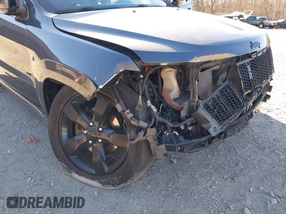 ✅ 2015 Jeep Grand Cherokee Overland • VIN: 1C4RJFCGXFC215750 • Лот: 40795135. Опубликован ранее на IAAI с пробегом 89 110 миль. Бесплатный доступ к архиву аукционных продаж из США и подробный отчёт об истории автомобиля на DreamBid. Изображение 17.