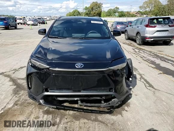 ✅ 2024 Toyota bZ4X XLE • VIN: JTMAAAAA7RA047077 • Lot: 84270505. Wystawiony na Copart z przebiegiem 34 900 mil. Bezpłatny archiwum sprzedaży aukcyjnych z USA i szczegółowy raport historii pojazdu na DreamBid. Zdjęcie 14.