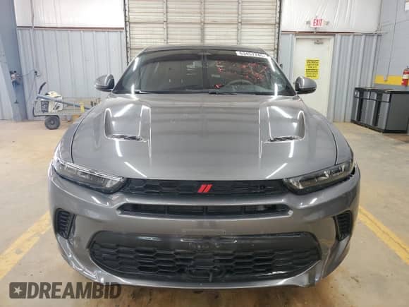 2024 Dodge Hornet R/T z VIN ZACPDFCW9R3A28979, wystawiony jako Copart lot #63457745 z przebiegiem 14 642 mil mil oraz Czysty tytuł • Clean title. Historia ofert i sprzedaży dostępna na DreamBid. Obrazek 5.