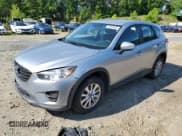 ✅ 2016 Mazda CX-5 Sport • VIN: JM3KE4BY2G0617549 • Lot: 58204555. Listed on Copart with 216,050 mi. Free auction sales archive from the USA and detailed vehicle history report at DreamBid. Image 1.