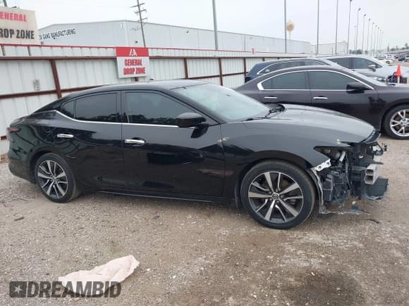 ✅ 2019 Nissan Maxima SL • VIN: 1N4AA6AV4KC380918 • Lot: 41267350. Wystawiony na IAAI z przebiegiem 97 206 mil. Bezpłatny archiwum sprzedaży aukcyjnych z USA i szczegółowy raport historii pojazdu na DreamBid. Zdjęcie 14.