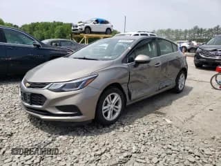 ✅ 2017 Chevrolet Cruze LT • VIN: 3G1BE6SM1HS534313 • Lot: 52442523. Listed on Copart with 62,258 mi. Free auction sales archive from the USA and detailed vehicle history report at DreamBid. Image 1.