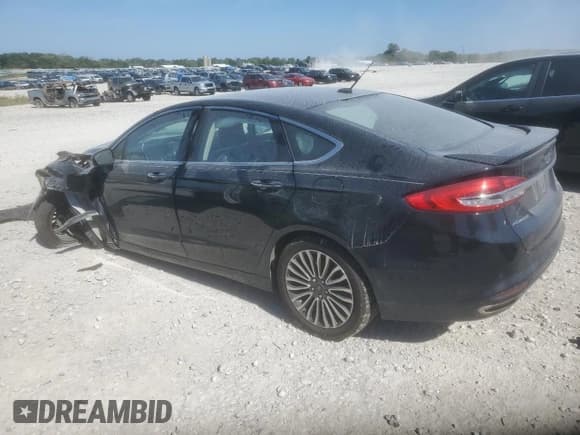 ✅ 2017 Ford Fusion Titanium • VIN: 3FA6P0D97HR251517 • Лот: 81607965. Опубликован ранее на Copart с пробегом 146 369 миль. Бесплатный доступ к архиву аукционных продаж из США и подробный отчёт об истории автомобиля на DreamBid. Изображение 2.