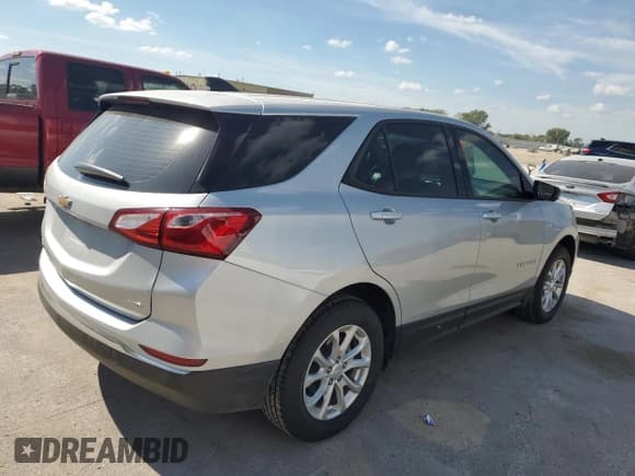 ✅ 2018 Chevrolet Equinox LS • VIN: 2GNAXREVXJ6317390 • Lot: 84550245. Wystawiony na Copart z przebiegiem 79 631 mil. Bezpłatny archiwum sprzedaży aukcyjnych z USA i szczegółowy raport historii pojazdu na DreamBid. Zdjęcie 3.