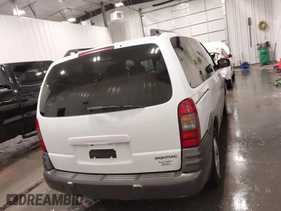 ✅ 2004 Pontiac Montana • VIN: 1GMDU03E74D167012 • Lot: 42211676. Listed on IAAI with 135,644 mi. Free auction sales archive from the USA and detailed vehicle history report at DreamBid. Image 16.