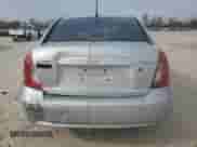 2010 Hyundai Accent GLS z VIN KMHCN4AC6AU500703, wystawiony jako Copart lot #82541114 z przebiegiem 188 357 mil mil oraz Szkoda całkowita • Salvage title. Historia ofert i sprzedaży dostępna na DreamBid. Obrazek 6.