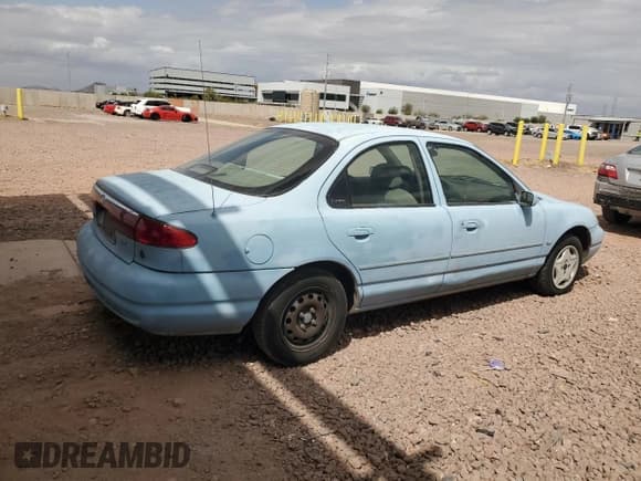 ✅ 1998 Ford Contour LX • VIN: 1FAFP66LXWK197384 • Lot: 51519385. Listed on Copart with 56,958 mi. Free auction sales archive from the USA and detailed vehicle history report at DreamBid. Image 3.