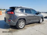 ✅ 2015 Jeep Cherokee Latitude • VIN: 1C4PJLCS5FW516841 • Lot: 84189215. Listed on Copart with 164,493 mi. Free auction sales archive from the USA and detailed vehicle history report at DreamBid. Image 3.