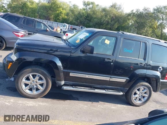 ✅ 2010 Jeep Liberty Limited • VIN: 1J4PN5GK4AW150710 • Lot: 43053552. Listed on IAAI with 100,672 mi. Free auction sales archive from the USA and detailed vehicle history report at DreamBid. Image 14.