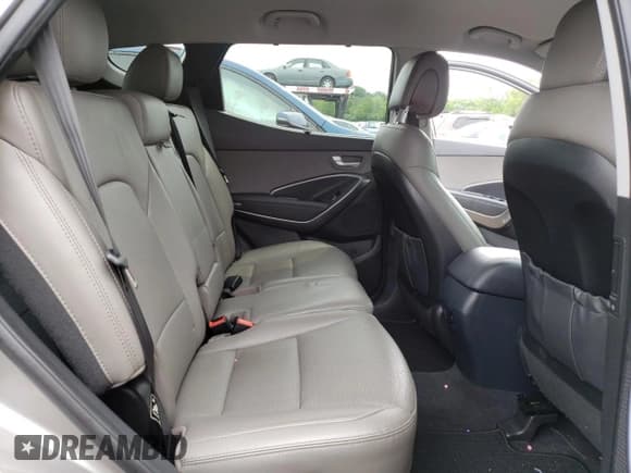 ✅ 2017 Hyundai Santa Fe 2.4L • VIN: 5NMZUDLB9HH023336 • Лот: 57510253. Опубликован ранее на Copart с пробегом 79 693 миль. Бесплатный доступ к архиву аукционных продаж из США и подробный отчёт об истории автомобиля на DreamBid. Изображение 11.